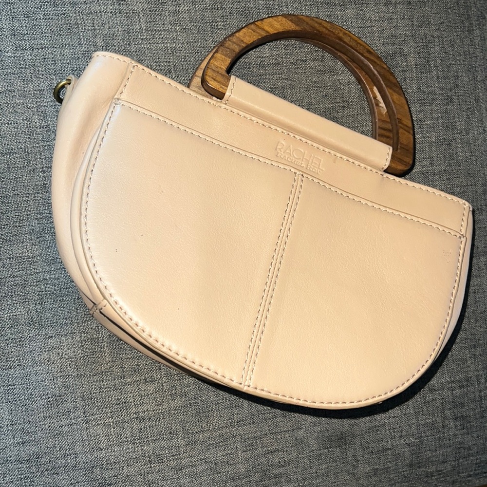 Tan Rachel Roy purse. Great used condition.wooden handles. Also can be crossbody